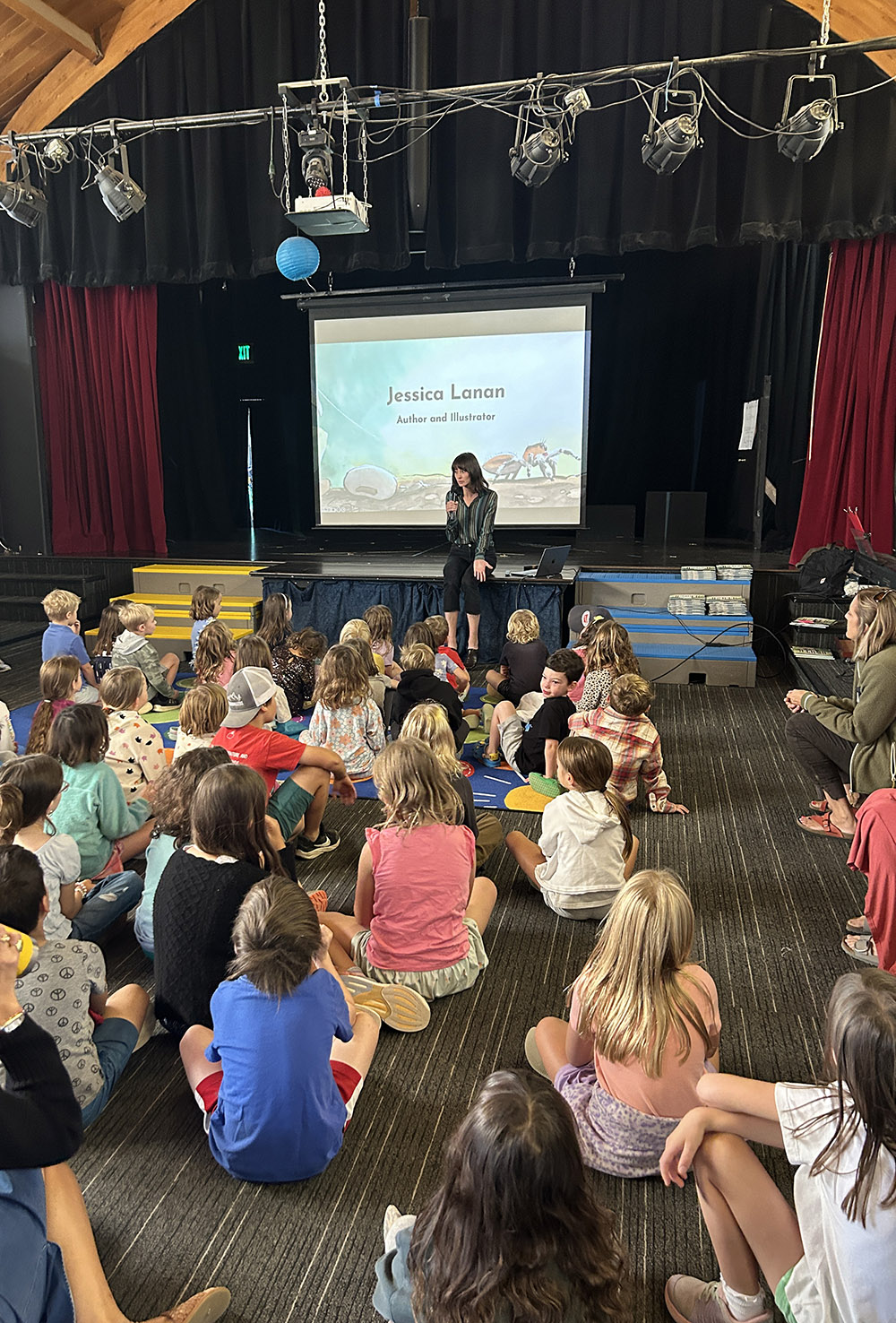 Photograph of Jessica Lanan presenting